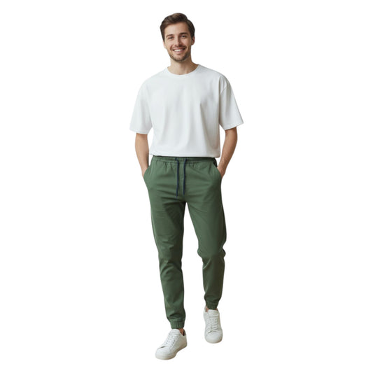 Man wearing a white t-shirt and green pants on a white background