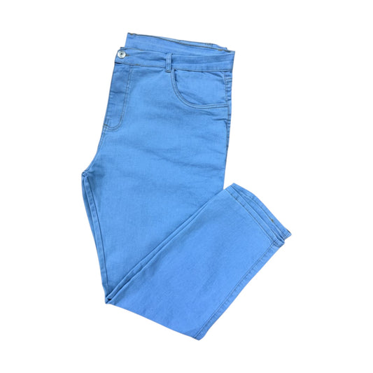 Blue jeans folded on a white background