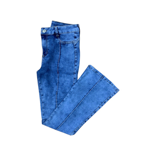 Folded blue jeans on a white background