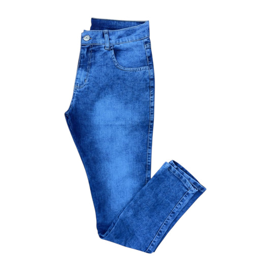 Folded blue jeans on a white background