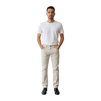 Man wearing a white t-shirt and beige pants on a white background