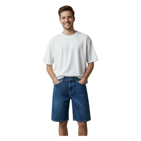 Man wearing a white t-shirt and blue denim shorts on a white background