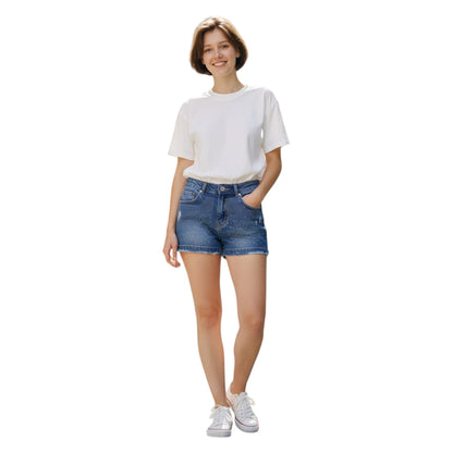 Woman wearing a white t-shirt and blue denim shorts on a white background