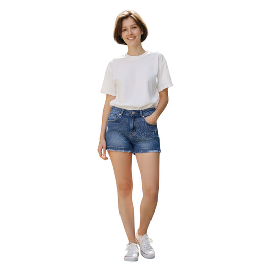 Woman wearing a white t-shirt and blue denim shorts on a white background