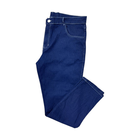 Folded blue jeans on a white background